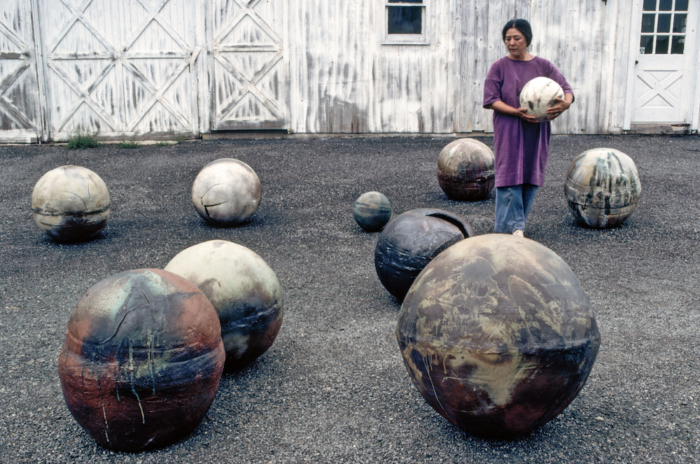 Toshiko Takaezu with moons, 1979. Photo: Hiro. Toshiko Takaezu Archives. © Family of Toshiko Takaezu